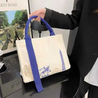 Canvas Bag With Ribbon Design