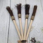 Broom-shaped pen